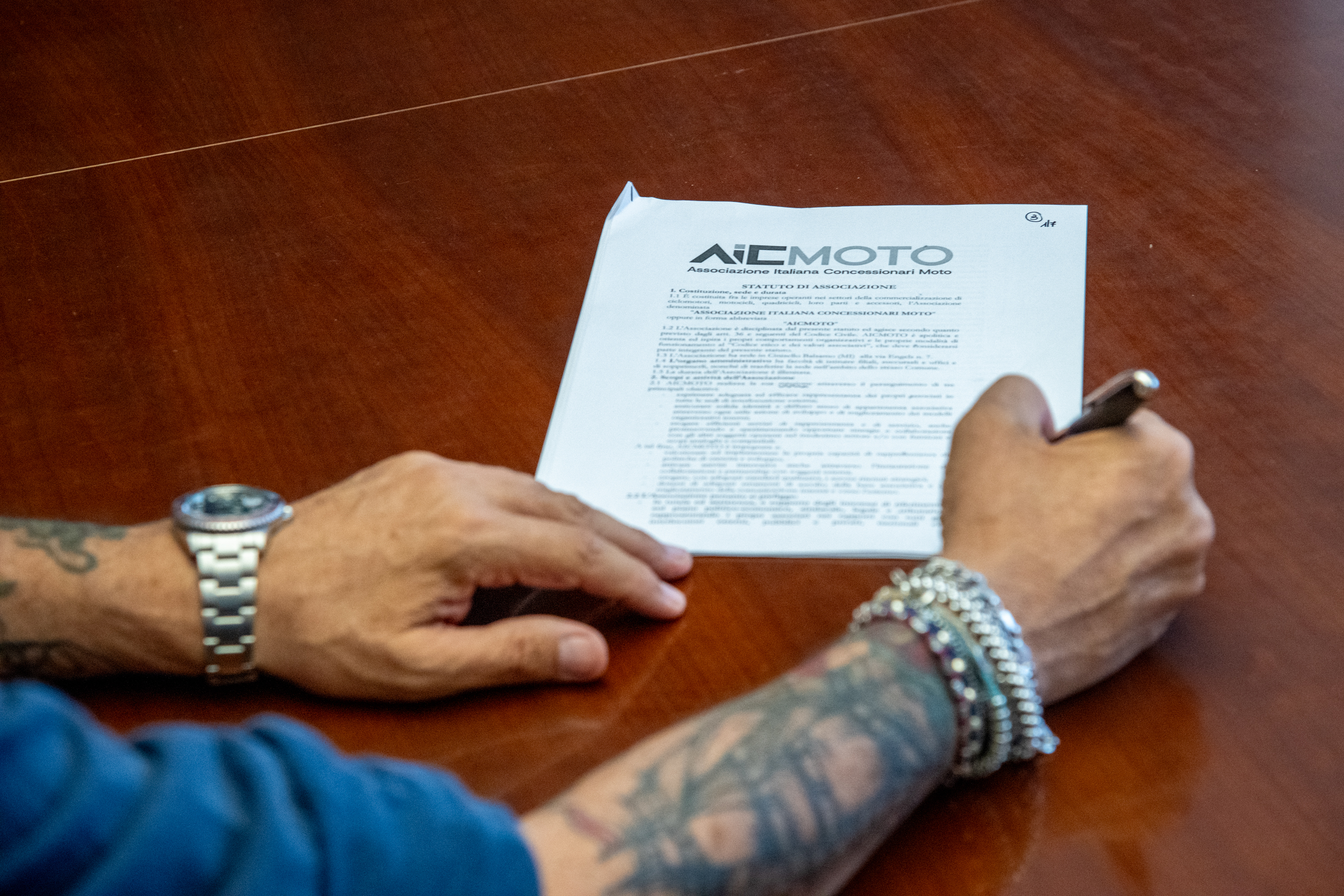 AICMOTO firma 3